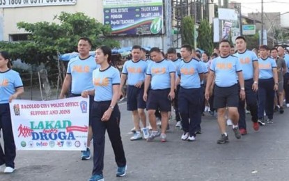 <p><strong>WALK FOR A CAUSE.</strong> Personnel of Bacolod City Police Office led by Senior Superindent Francisco Ebreo, officer-in-charge, join the ‘Lakad Iwas Droga’: The CADCoB Walk for a Cause 2018 on Friday morning (June 15, 2018). <em>(Photo courtesy of Bacolod City Police Office) </em></p>